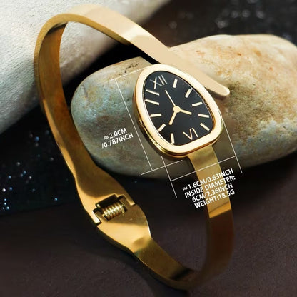 A Women'S Bracelet in a Classic Watch Design Featuring Roman Numerals Etched Into The Open Strap, Made of Stainless Steel